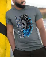 All Grit Lion Head Bold Graphic T Shirt Strength Street Style - model wearing grey tee, leaning on column