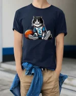 Cute Basketball Cat Graphic T Shirt Funny Sport Cat Tee - model wearing navy tee with hands in pockets