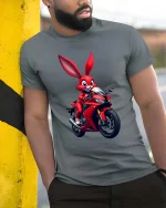 Funny Biker Bunny T-Shirt Cool Rabbit Motorcycle Rider Tee - model wearing grey tee, leaning on column