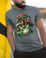 Cute Frog Mushroom T Shirt Fantasy Nature Cartoon Graphic Tee - model wearing grey tee, leaning on column