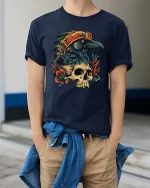 Gothic Raven Skull Graphic T Shirt Dark Floral Bird Art Style Tee - model wearing navy tee with hands in pockets