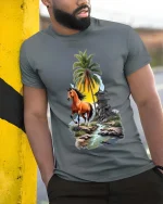 Running Horse Tropical Landscape Graphic T Shirt Sunset Island Vibes - model wearing grey tee, leaning on column