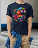 Colorful Parrot Floral Graphic T Shirt Tropical Bird Art Style - model wearing navy tee with hands in pockets