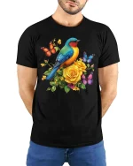 Colorful Bird And Butterfly Floral Graphic T Shirt Nature Art - model wearing black tee with hands behind back