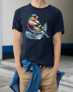 Colorful Songbird Graphic T Shirt Vibrant Nature Art Tee - model wearing navy tee with hands in pockets