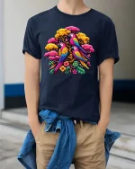 Vibrant Parrot Garden T Shirt Exotic Bird Floral Graphic Tee - model wearing navy tee with hands in pockets