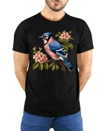 Blue Jay Bird Blossom Graphic T Shirt Elegant Nature Art Tee - model wearing black tee with hands behind back