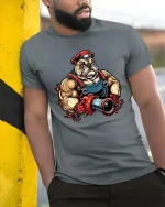 Tough Bulldog Firefighter T Shirt Muscular Rescue Hero Graphic Tee - model wearing grey tee, leaning on column
