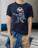 Zombie T Rex Skeleton Graphic T Shirt Funny Dino Horror Tee - model wearing navy tee with hands in pockets