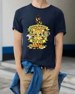 Burn Bright Not Out Candle Graphic T Shirt Funny Motivational Art - model wearing navy tee with hands in pockets