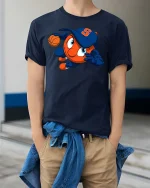 Basketball Mascot Cartoon Action Sports Graphic T Shirt - model wearing navy tee with hands in pockets