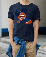 Angry Mascot Jumping Cartoon Sports Fan Graphic T Shirt - model wearing navy tee with hands in pockets