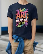 Art Happens Here Colorful Graphic T Shirt Creative Paint Splash Style - model wearing navy tee with hands in pockets
