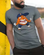 Angry Orange Mascot Cartoon Sports Fan Graphic T Shirt - model wearing grey tee, leaning on column