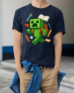 Pixel Monster Student School Supplies Cartoon Graphic T Shirt Tee - model wearing navy tee with hands in pockets