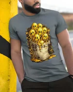 Cute Melting Ghost Characters Gold Style Graphic T Shirt Tee - model wearing grey tee, leaning on column