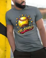 All Stars Softball Graphic T Shirt Golden Ball Sports Tee - model wearing grey tee, leaning on column