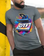 DTF Heat Press Printing Funny Graphic T-Shirt Color Splash - model wearing grey tee, leaning on column