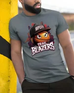 Rip City Basketball Street Style Trail Blazers Fan T-Shirt - model wearing grey tee, leaning on column