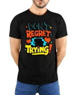 Dont Regret Just Try Bold Motivational Quote Graphic Tshirt - model wearing black tee with hands behind back