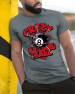 Crazy Billiard Ball Skull Style Funny Pool Graphic Tshirt - model wearing grey tee, leaning on column
