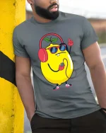 Cool Lemon Music Vibes Graphic T-Shirt Funny Fruit Tee - model wearing grey tee, leaning on column