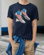 USA Flag Sneakers Patriotic Style Graphic T Shirt - model wearing navy tee with hands in pockets