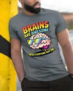 Brains Are Awesome Funny Smart Humor Graphic T Shirt - model wearing grey tee, leaning on column
