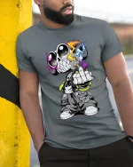 Street Skull Rebel Neon Urban Graphic T Shirt Style - model wearing grey tee, leaning on column