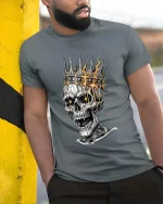 Burning Crown Skull King Dark Gothic Graphic T Shirt - model wearing grey tee, leaning on column