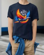 From Ashes We Rise Phoenix Jet T Shirt Bold Fighter Spirit Art - model wearing navy tee with hands in pockets