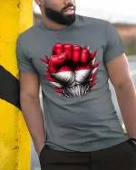Powerful Red White Fist T Shirt Bold Strength Statement Graphic - model wearing grey tee, leaning on column